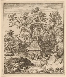 Paisaje con piedra de molino cerca de un barril