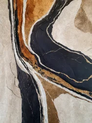 Flujo de mármol negro y dorado