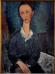 La mujer con cuello blanco