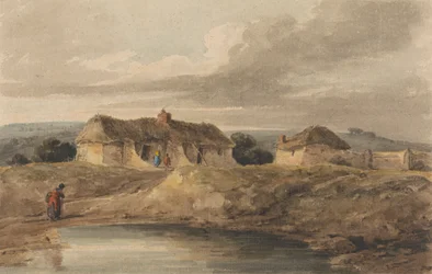 Paisaje con edificios de paja