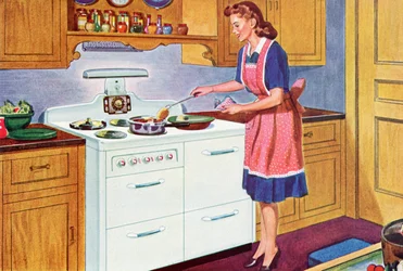 Ama de casa de los años 40 cocinando la cena en su cocina de ensueño