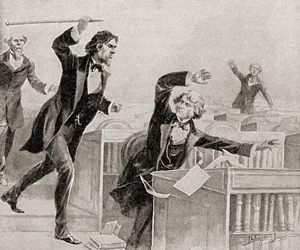 Preston Smith Brooks, ferviente defensor de la esclavitud, agrediendo con un bastón al senador Charles Sumner, abolicionista, en el pleno del Senado de los Estados Unidos, el 22 de mayo.