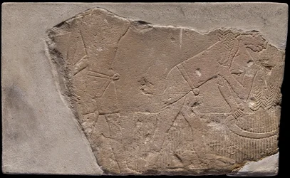 Fragmento de pared de una tumba con una escena de cosecha