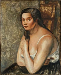 Mujer sentada con camisa.
