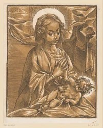 María adora al niño Jesús