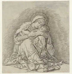 María sentada con el niño