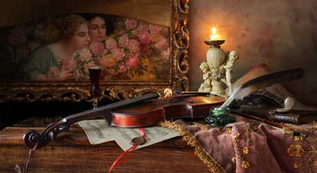 Naturaleza muerta musical a la luz de las velas