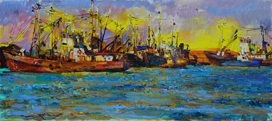 Barcos de pesca al atardecer