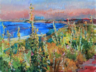 Puesta de sol sobre las flores de la costa