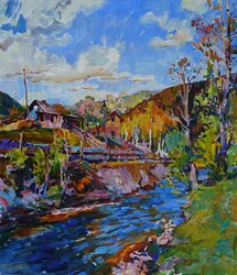 Un animado pueblo junto al río en la montaña