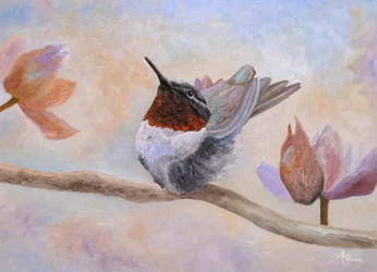 Un colibrí entre las flores