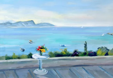 Una terraza con vista al mar