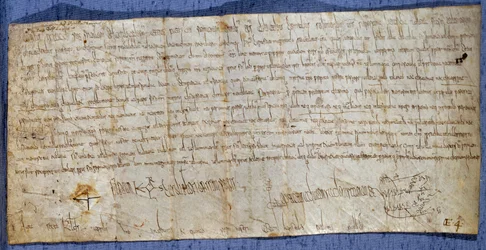 Carta del rey Carlomagno (Carlos I, Carlos el Grande o Carolus Magnus) (742-814) que exime a la abadía de Saint-Denis del pago de peajes durante la feria. Finales del siglo VIII. París, Archivos Nacionales