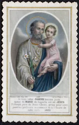 Imagen piadosa: Jesús niño en los brazos de José
