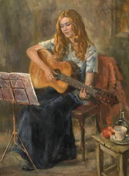 Nichola tocando su guitarra