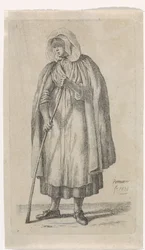 Mujer con capa y bastón