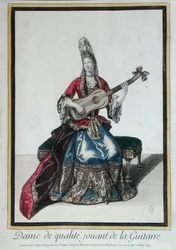 Dama tocando la guitarra