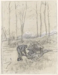 Agricultor trabajando con una carretilla en el bosque