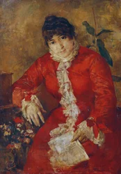 Mujer en vestido escarlata con hoja de periódico y ficus.