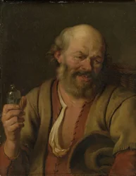 Un hombre con una botella de ginebra