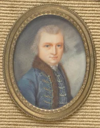 Retrato de hombre con solapas azules.