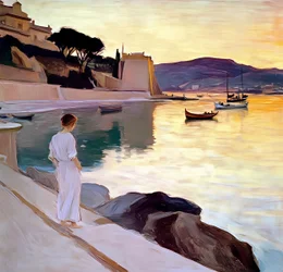 Una mujer en la costa al atardecer