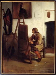 Un joven pintor en su taller