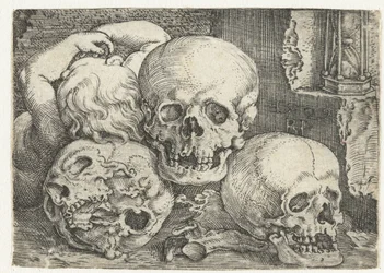 Niño con tres calaveras