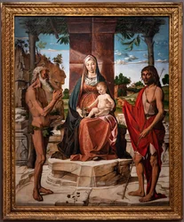 Virgen con el niño Jesús bajo una pérgola entre los santos Juan Bautista y Onufriusm 1485-86 (óleo sobre tabla)