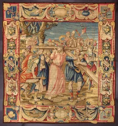 Cristo y Simón de Cirene (el Cirineo). (Quinta parada del Vía Crucis (llevando la cruz). Un trozo de la cruz lleva la inscripción I.N.R.I. (INRI). Tapiz realizado en las manufacturas de Bruselas. Siglo XVI Genes, Musei di Strada Nuova