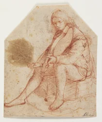 Joven sentado con viola