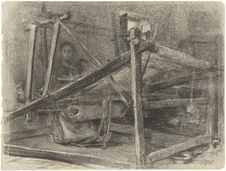 Máquina de tejer y una mujer en el fondo