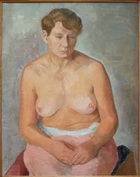Desnudo femenino sentado
