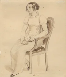 Una dama sentada en un sillón, mirando hacia la ventana