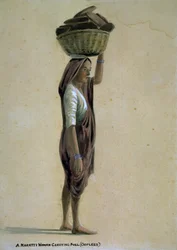 Una mujer mahratta cargando combustible (ooplees), India