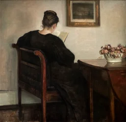 Interior, mujer leyendo