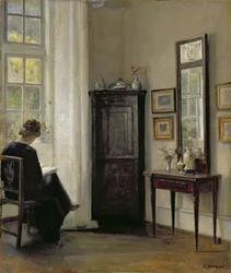 Interior con mujer leyendo