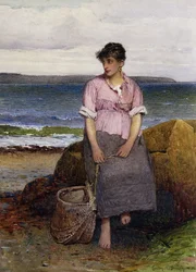 Una joven pescadora junto al mar