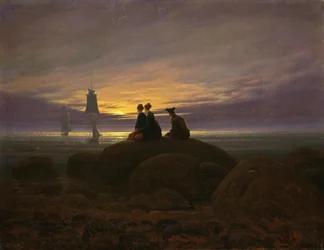 Salida de la luna junto al mar