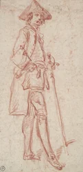 hombre de pie, sosteniendo una espada
