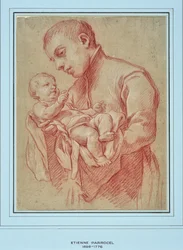 Joven religioso sosteniendo a un niño