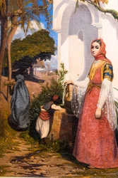 Mujer oriental en la fuente