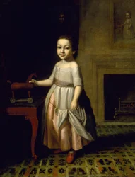 Niño con caballo de juguete