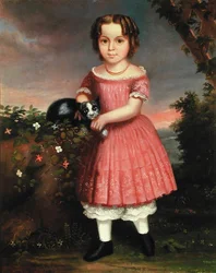 Retrato de un niño acariciando un gato