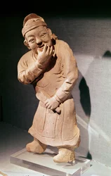 Figurilla de un actor silbando, de Jiaozuo, Henan, Dinastía Yuan (1271-1368)