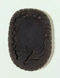Piedra de tinta tallada como la gran tortuga mítica Lo-shu entre olas, probablemente dinastía Ming