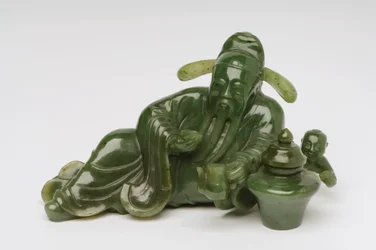 Figura de erudito chino reclinado