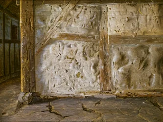 Muro blanqueado con cal y entramado de madera