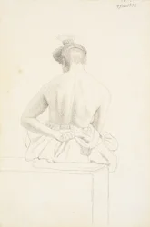 Modelo femenina sentada vista desde atrás