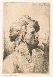 Hombre con sombrero de piel y pluma